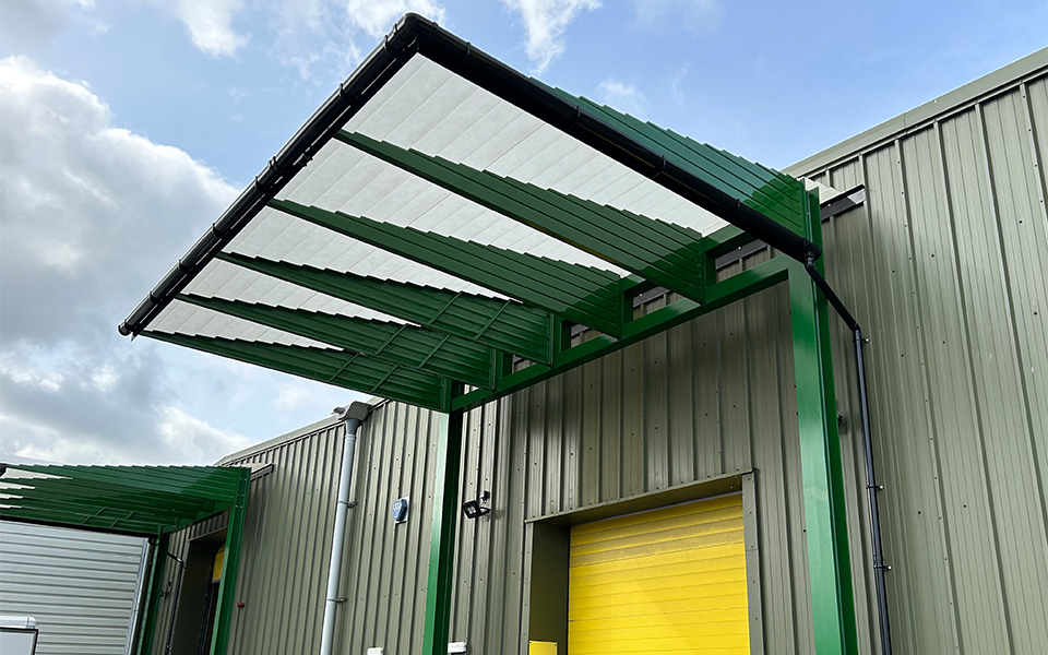 Large green loading bay canopy