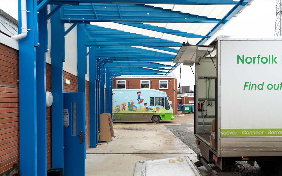 Light blue canopy used as a loading bay
