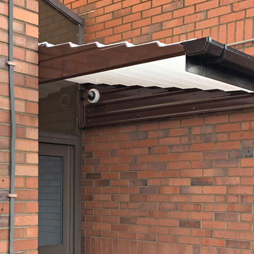 side view of an entrance canopy going into an nhs hospital