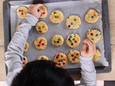 child baking biscuits
